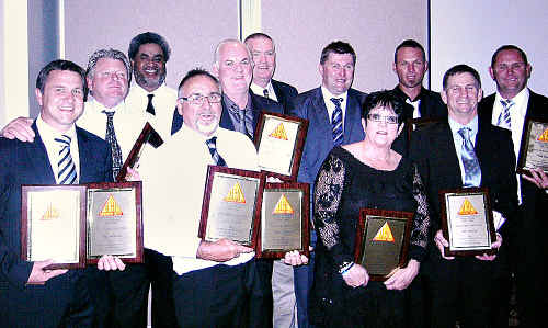 Members of the Gympie Cats football club inducted into the Sunshine Coast Australian Football Hall of Fame are (from left) Dean Warren, Roy Groom, Ned Piggott, Ray Warren, sons of John McMullen: Steve and Peter, Michael Crough, Helen Warren, Angus Nevin, Bob Baldry’s son Marty, and Glenn Warren. Absent are Kevin and Val Andrews. Members of the Gympie Cats football club inducted into the Sunshine Coast Australian Football Hall of Fame are (from left) Dean Warren, Roy Groom, Ned Piggott, Ray Warren, sons of John McMullen: Steve and Peter, Michael Crough, Helen Warren, Angus Nevin, Bob Baldry’s son Marty, and Glenn Warren. Absent are Kevin and Val Andrews.